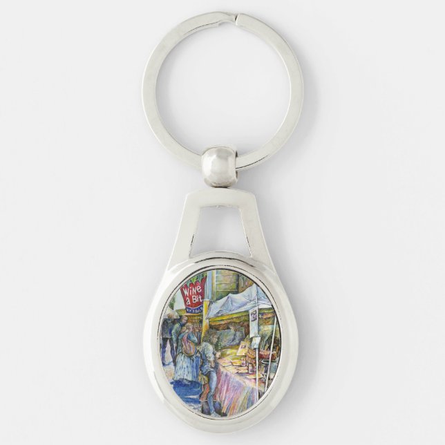 Hörnet av Flying Gris Farm och Vin en bit. Ovalt Silverfärgad Nyckelring (Framsidan)