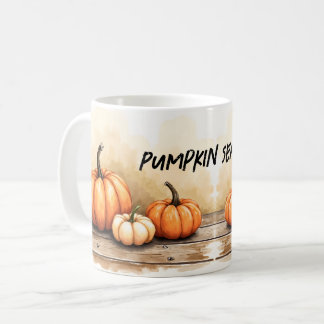 Höstpumpor på trätabell kaffemugg