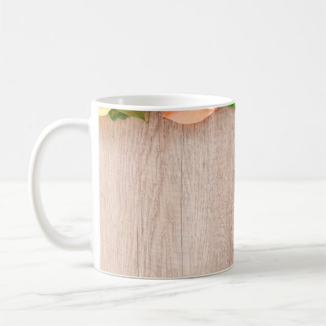 Höstpunktens orange - röd gult kaffemugg (Vänster)
