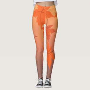 Höstsymbolen med mönstereffekten löv och båge leggings