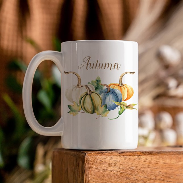 Höstvågfärgspumpor Kaffemugg (Beautiful watercolor pumpkins in shades of blue, green, orange, and white are featured on this mug)