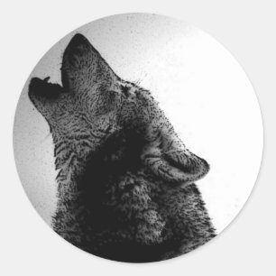 Howling Varg i Snö Runt Klistermärke