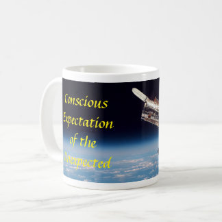 Hubble-rymdteleskopet med ursprunglig motto Mug Kaffemugg