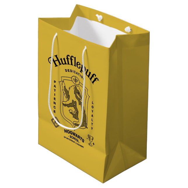 HUFFLEPUFF™ Hängivenhet Tålamod Lojalitet Vapenmär (Framsidan Vinklad)