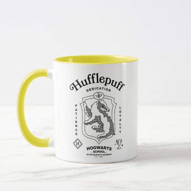 HUFFLEPUFF™ Hängivenhet Tålamod Lojalitet Vapenmär Mugg (Vänster)