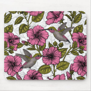 Hummingbird och rosa hibiscus-blommor musmatta