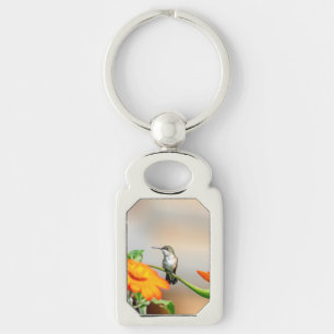 Hummingbird på en blommar anläggning rektangulärt silverfärgad nyckelring