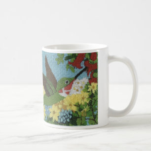 Hummingbird reproducerad från en räckabroderi kaffemugg