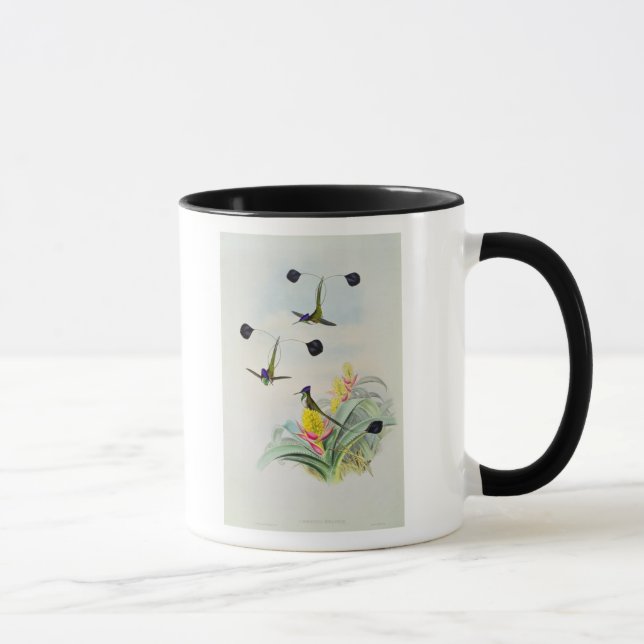 Hummingbird som inristas av Walter och Cohn Mugg (Höger)