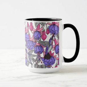 Hummingbird-trädgård i melrose och rosa mugg