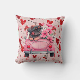 Hund i en bil med hjärtan kudde