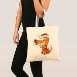 Hund i tomten Tote Bag Tygkasse<br><div class="desc">Den här designen är en hund i en jultomte. Hund har en stor flin vid ansikte när den bär julhatten. Den här hund i en jultomtedesign ser underbar ut på den här Tote Bag</div>