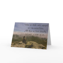 Hund och kvinna på en Rocky Bluff