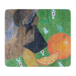Hund och orange skärbräda