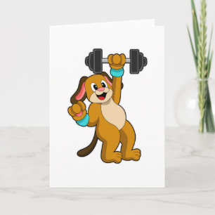 Hund på styrketräning med hantel kort