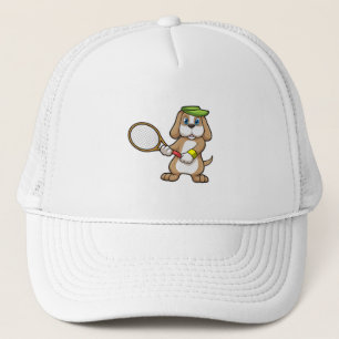 Hund på Tennis med tennis racket & Cap Keps