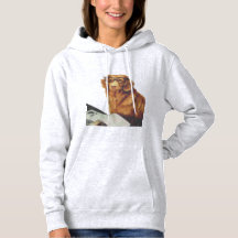 Hund sitta framför en tidning