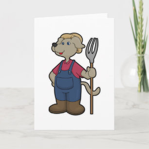 Hund som bonde med kratta och hatt kort