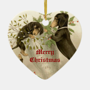 Hundar leker med jultomte och heliga bär julgransprydnad keramik