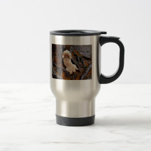Hunden bland rotar resemugg