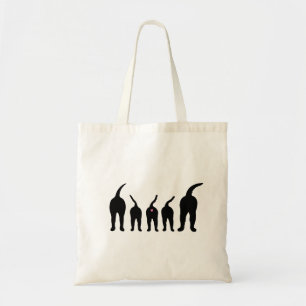 Hunden knuffar silhouetten tygkasse