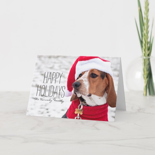 Hundhund som ha på sig ett vinterlag och jul helgkort (Framsida)