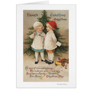 Hurtig jul GreetingKids vid ett träd Hälsningskort