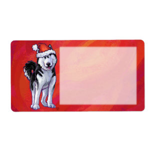 Husky i Santa Hat On Red Fraktsedel