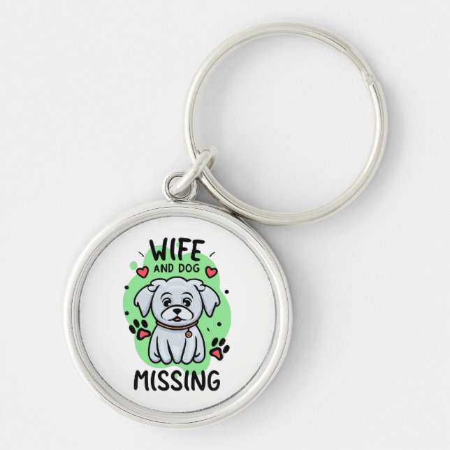 Hustru och hund saknas rund silverfärgad nyckelring (Framsidan)