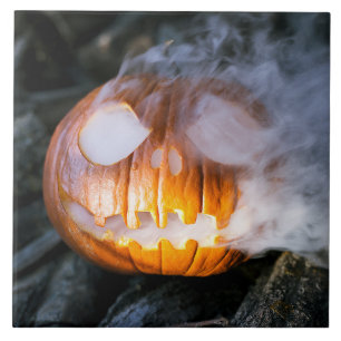Huvudlösa ryttarens jack-o-lantern-huvud i lågor kakelplatta