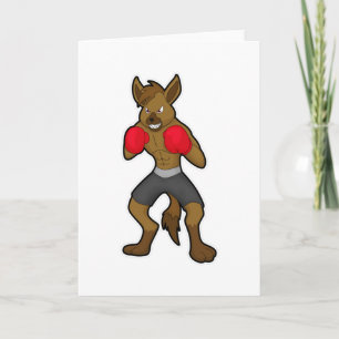 Hyena på boxning med boxningshandskar kort