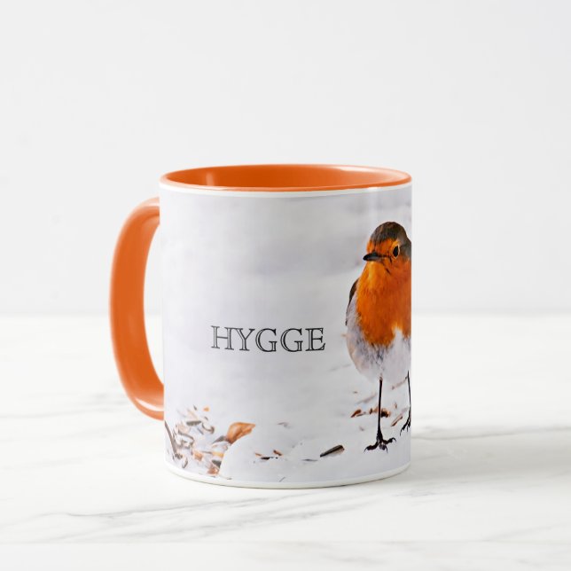 Hygge med en söt rånfågel i snö mugg (Framsida vänster)