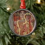 Hygieia av Gustav Klimt, Vintage Art nouveau Julgransprydnad Metall<br><div class="desc">Hygieia (c. 1901) av Gustav Klimt är en vintage av Viktorian Era Symbolism-målning med den grekiska gudinnan av hygien, hälsa, renlighet och sanitet tillsammans med den asculapiska ormen runt hennes arm och kopp av Lethe i hennes hand. Hygieia är en del av en av tre målningar som kallades "Faculty Paintings"...</div>