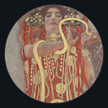 Hygieia av Gustav Klimt, Vintage Art nouveau Runt Klistermärke<br><div class="desc">Hygieia (c. 1901) av Gustav Klimt är en vintage av Viktorian Era Symbolism-målning med den grekiska gudinnan av hygien, hälsa, renlighet och sanitet tillsammans med den asculapiska ormen runt hennes arm och kopp av Lethe i hennes hand. Hygieia är en del av en av tre målningar som kallades "Faculty Paintings"...</div>