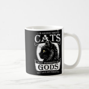 I antika tider blev katter lastade som godtrogna. kaffemugg