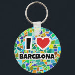 I kärlek Barcelona Nyckelring<br><div class="desc">I kärlek Barcelonas nyckelring med Gaudí inspirerade till bruten keramik.</div>