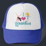 I Kärlek Gymnastics Cute Gymnast Keps<br><div class="desc">I Kärlek Gymnastics. En söt gymnastikflicka som ger en vacker tealtext mellan två tumlande flickor och ett vackert rosa hjärta. En söt gymnast närvarande för ett barn eller för kvinnors gymnastiktränare.</div>