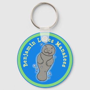 I kärlek manatees söt illustration av tecknad nyckelring