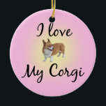 I Kärlek My Corgi Julgransprydnad Keramik<br><div class="desc">Ett vackert pembroke welsh corgi-prydnadsämne för Julgran. Jag Kärlek My Corgi skrev på söt rosa ornament med en söt röd och vit corgi i mitten. Anpassa genom att lägga till Corgis namn på baksidan.</div>