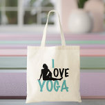 I Kärlek Yoga Tygkasse<br><div class="desc">Cute yoga-gåva med yoga skriven i vackert teal färg och en kvinna sträckte sig ut i en söt supine twist-ställning vid studion. Coola Yogalärare närvarande.</div>