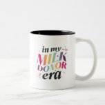 I min Mjölk Donor Era Två-Tonad Mugg<br><div class="desc">Fira din supermakt med den här lekande designen, för ge flytande guld förtjänar lite gnistra! Vare sig du rockar den på en T, tote eller mugg, är den här djärva svarta och regnbågssletten omgiven av stjärnor och hjärtan en färgstark hyllning till din mjölk-donerande resa. Perfekt för att pumpa in mamor,...</div>