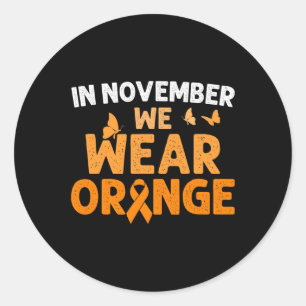 I november uppmärksammar vi Orangen Crps Awareness Runt Klistermärke
