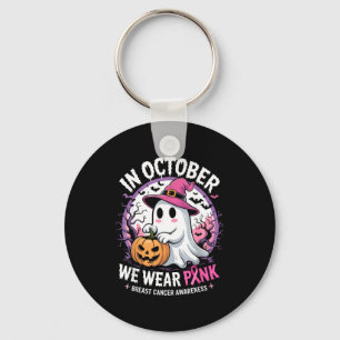 I oktober bär rosa spök Halloween bröstcancer Nyckelring