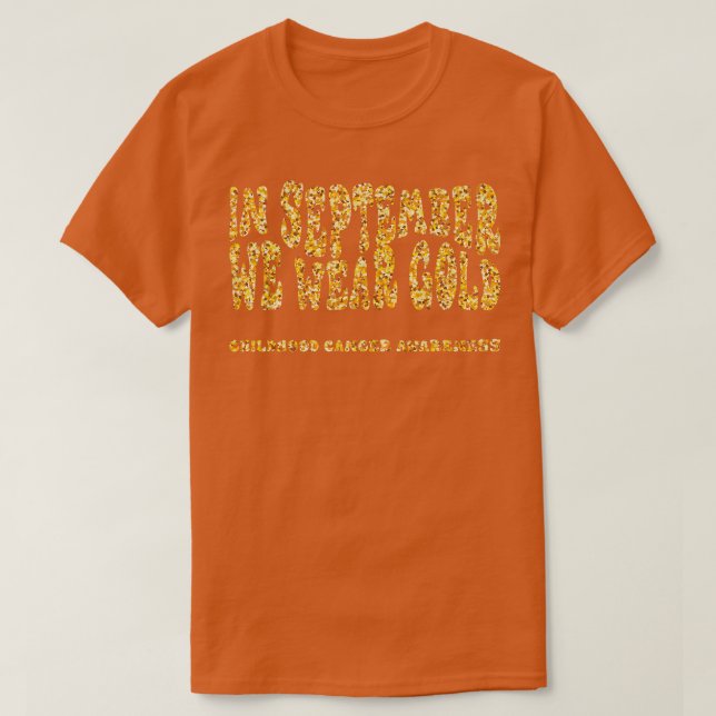 I september 2011 gav vi Guld barncancervårdsbelöni T Shirt (Design framsida)