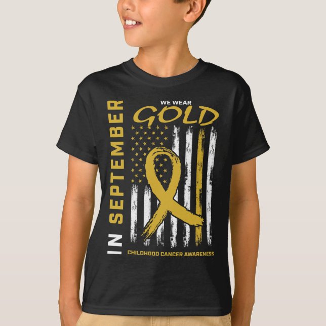 I september 2011 gav vi Guld barncancervårdsbelöni T Shirt (Framsida)