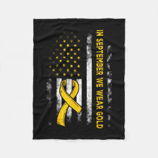 I september bär guld flagga barncancer fleecefilt