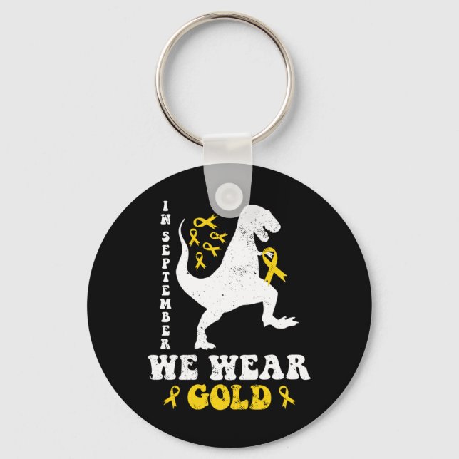 I september bär vi guld Trex barncancer Nyckelring (Framsida)