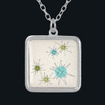 Iconic atom- Starbursts halsband<br><div class="desc">Detta Iconic atom- Starbursts halsbandmönster presenterar iconic atom- starbursts. Det är höger! Old school, lagar mat med grädde kulör bakgrund med guld- stänk är den perfekta bakgrunden för den vibrerande turkosen, rogivande selleri, och den kitschy peargröntfärgaden cirklar. Fläckarna av färg förläggas sporadically i olikt storleksanpassar med att överdra formad linjer...</div>