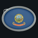 Idaho Flagga: delstaten Gem, Västern America Mount<br><div class="desc">Idaho statlig flagga, ett enkelt men mäktigt emblem, antogs officiellt 1907. Dess utformning, en fält av blått som är präglad av statsstämpeln, återspeglar statens natursköna och rik historia. Det blå fält symboliserar de stora himmel och rikliga vatten-resurser som kännetecknar Idaho. - I centrum av flagga ljugs statsstämpeln, ett mästerverk designat...</div>