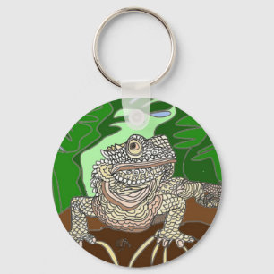 Iguana vid sten nyckelring